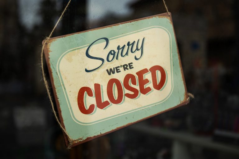 Sign reading "Sorry we're closed"